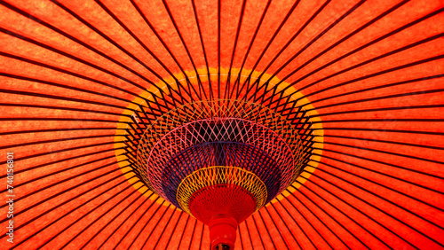 Japanese traditional red paper umbrella close up.