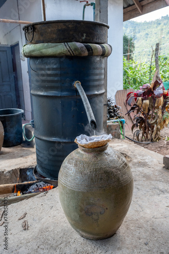 Distillation of Laos Whisky in a village near Luang Prabang, Laos, South-East Asia