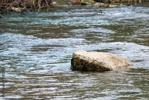 water flowing over the river
