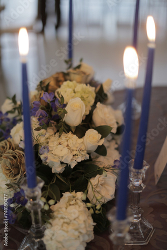 Candles with white flowers