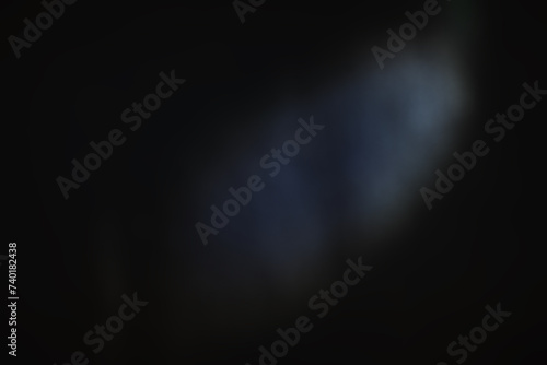 Glare dark surface. Abstract background. Light spots. Out of focus glow. Shiny surface