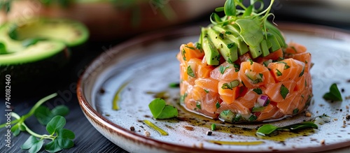 A delectable delight featuring delicious salmon and creamy avocado, perfectly arranged on a plate.