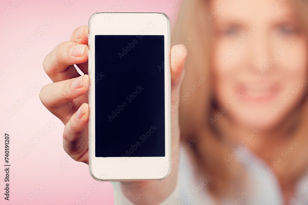 Young female  hold the mobile phone