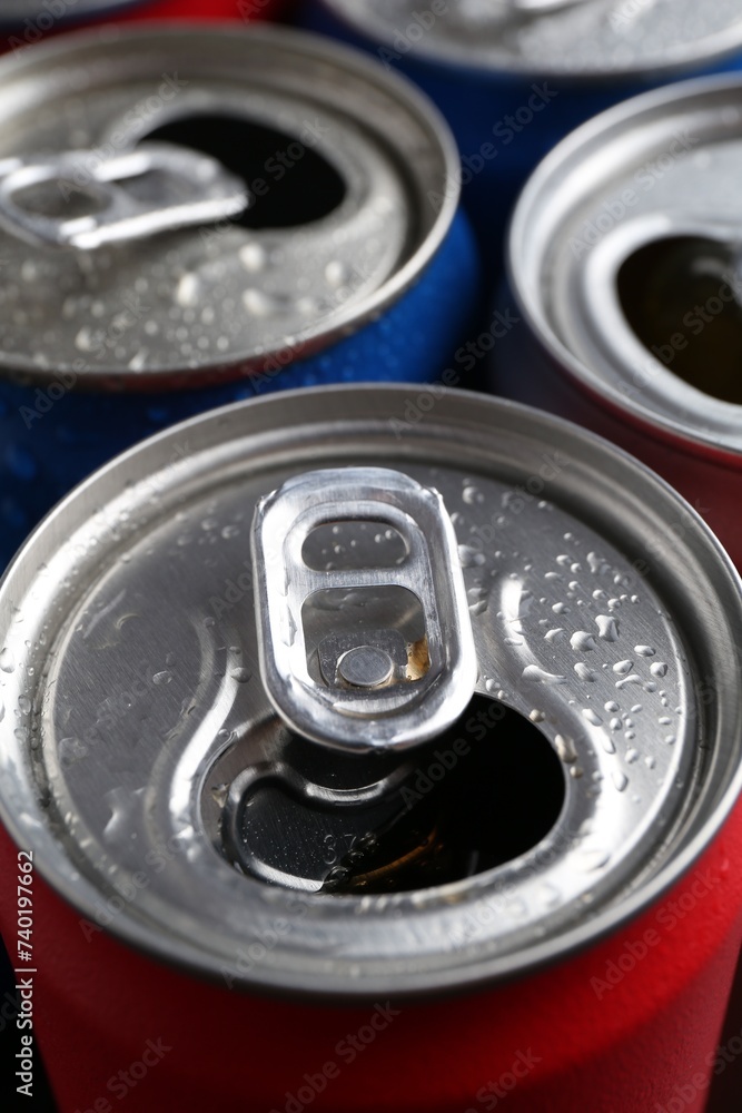 Energy drinks in wet cans as background, closeup. Functional beverage Energy drinks in wet cans as background, closeup. Functional beverage