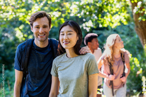 Young adult couple looking at the camera during hiking excursion © PhotoAlto