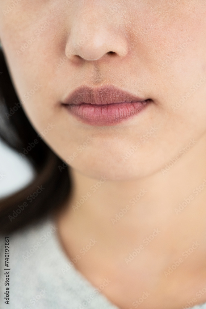 Obraz premium Framing of mouth of a young adult woman