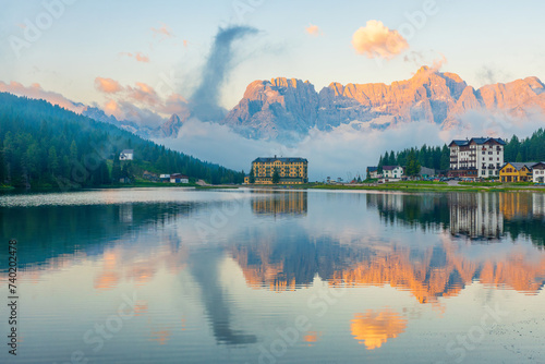 Lake Misurina in Dolomites mountain, Italian Alps, Belluno, Italy. Alpine Lago di Misurina with reflection at sunrise near Cortina dAmpezzo . Summer vacation destination photo