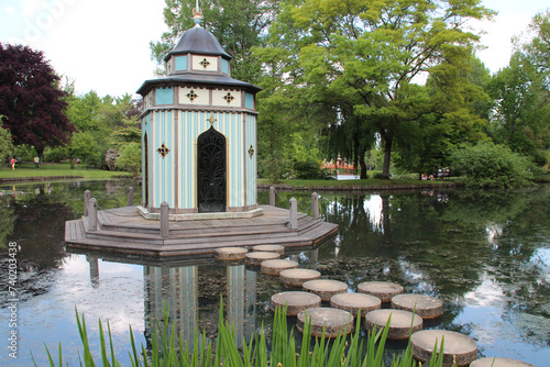folly and lake in a park in apremont-sur-allier in france 