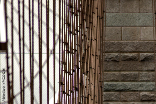 Left steel cables of the Brooklyn Suspension Bridge linking the boroughs of Manhattan and Brooklyn in New York City (USA), the largest suspension bridge in the world until 1889.