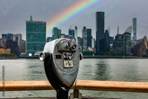 The Manhattan skyline with a rainbow seen with a Long Island prism, which is an island that extends across New York (USA) from where you can see the skyscrapers of the Big Apple.