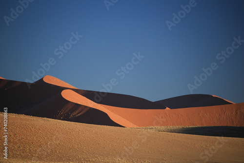 red sand landscape of namib desert photo