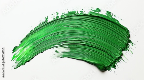 Hand painted stroke of green paint brush on white background.