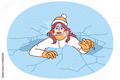 Drowning woman is trying to get out of hole in which fell while walking on frozen lake for concept adverse environmental conditions. Drowning girl got into trouble after natural disaster