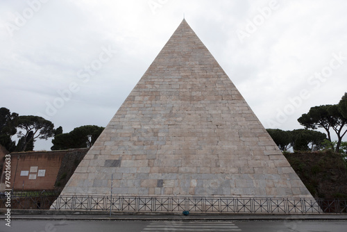 Italy Rome Pyramid of Cestius on a cloudy spring day