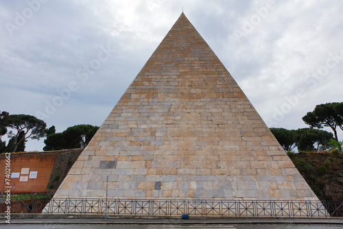 Italy Rome Pyramid of Cestius on a cloudy spring day