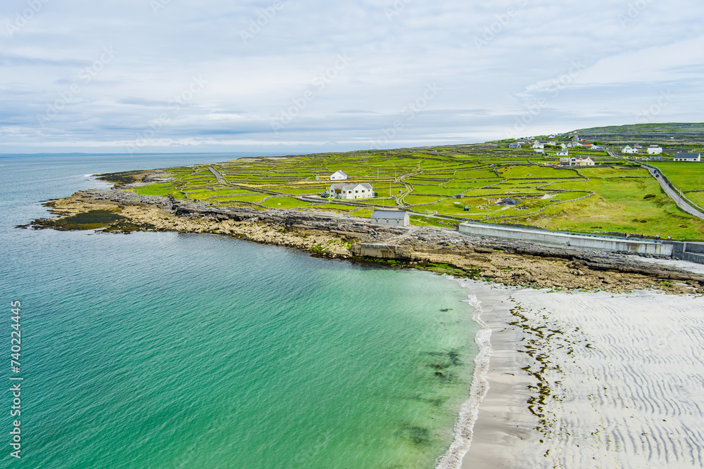 Aerial view of sandy Kilmurvey Beach on Inishmore, the largest of the Aran Islands in Galway Bay, Ireland.