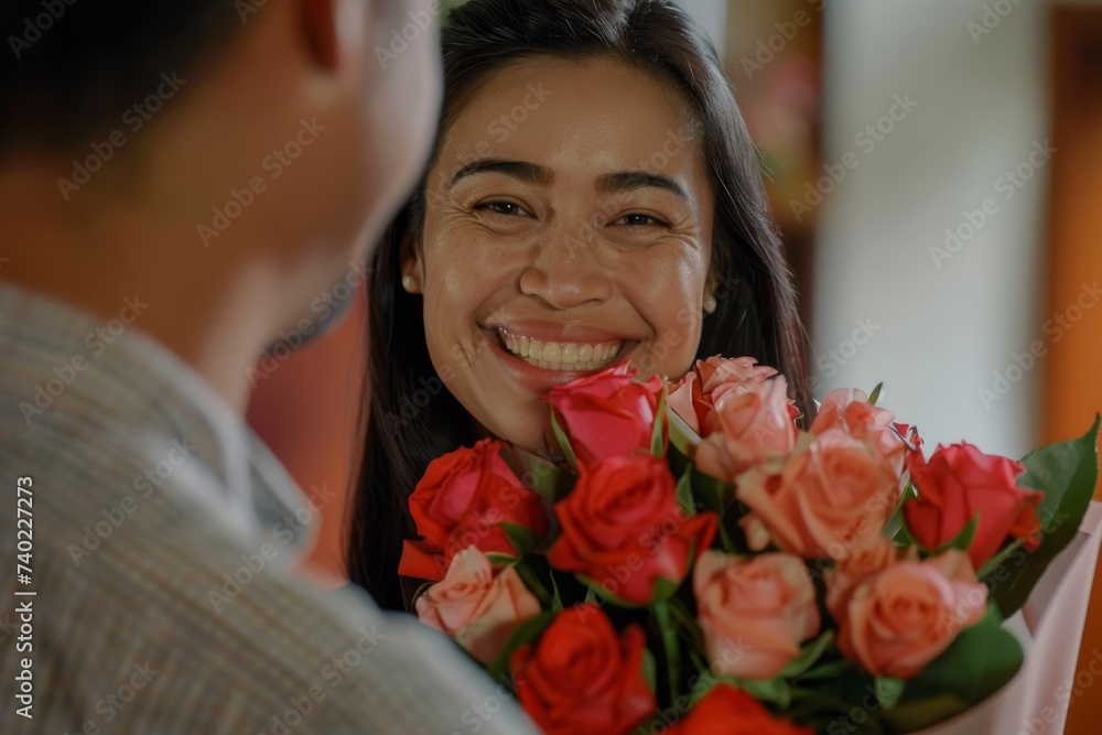 A radiant woman arranges a vibrant bouquet of fresh roses, her smile reflecting the joy of a beautiful indoor floral design for a wedding A radiant woman arranges a vibrant bouquet of fresh roses, her smile reflecting the joy of a beautiful indoor floral design for a wedding
