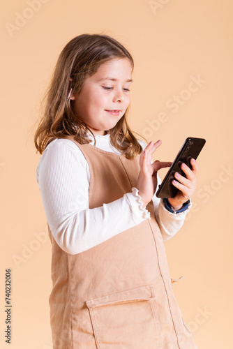 girl looking at a phone smiling