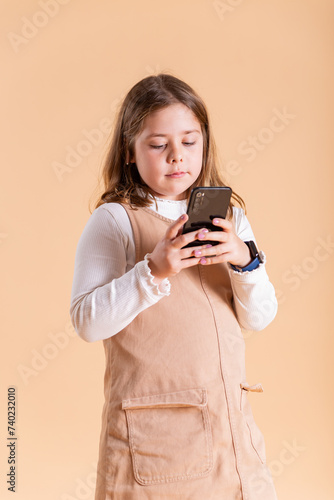 girl looking at a phone smiling