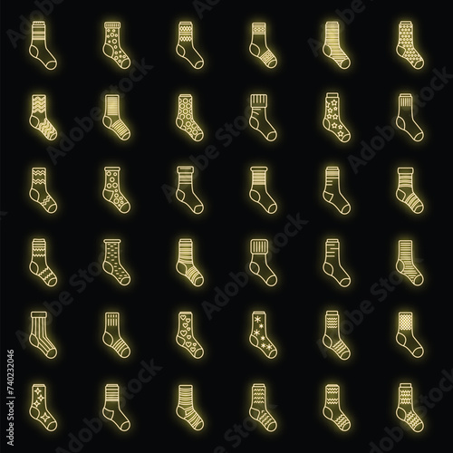 Cotton socks icons set. Outline set of cotton socks vector icons neon color on black