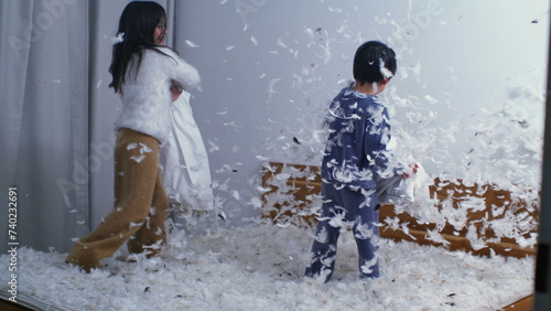Siblings Joyful Pillow Battle - Feathers in the Air, Captured in Slow Motion at 1000 FPS