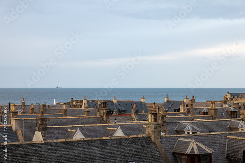 19 February 2024. Cullen,Moray,Scotland. This is the rooftop view of the old seatown village of Cullen with a lot of chimneys and roofing slates. photo
