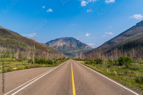 Road traverses through valley in Waterton Lakes National Park, Alberta, Canada
