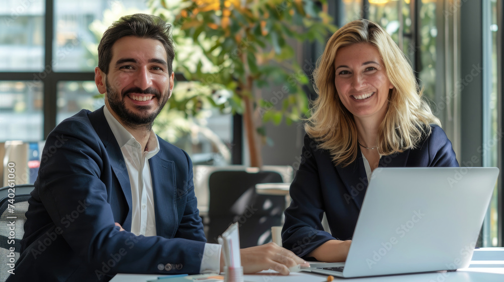 A Mature, Happy and Confident Businesswoman Next to a Young Man in the Office. She Represents a Diverse Team of Corporate Managers and Collaborates Seamlessly as Executive Colleagues. Generative AI. A Mature, Happy and Confident Businesswoman Next to a Young Man in the Office. She Represents a Diverse Team of Corporate Managers and Collaborates Seamlessly as Executive Colleagues. Generative AI.