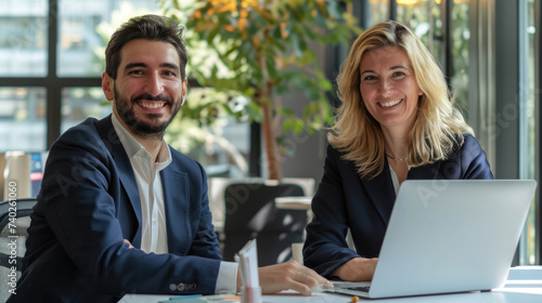 A Mature, Happy and Confident Businesswoman Next to a Young Man in the Office. She Represents a Diverse Team of Corporate Managers and Collaborates Seamlessly as Executive Colleagues. Generative AI.