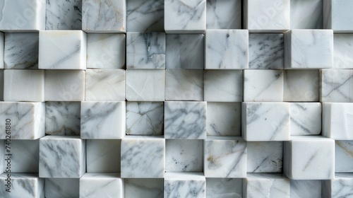 Marble cubes arranged on a seamless background