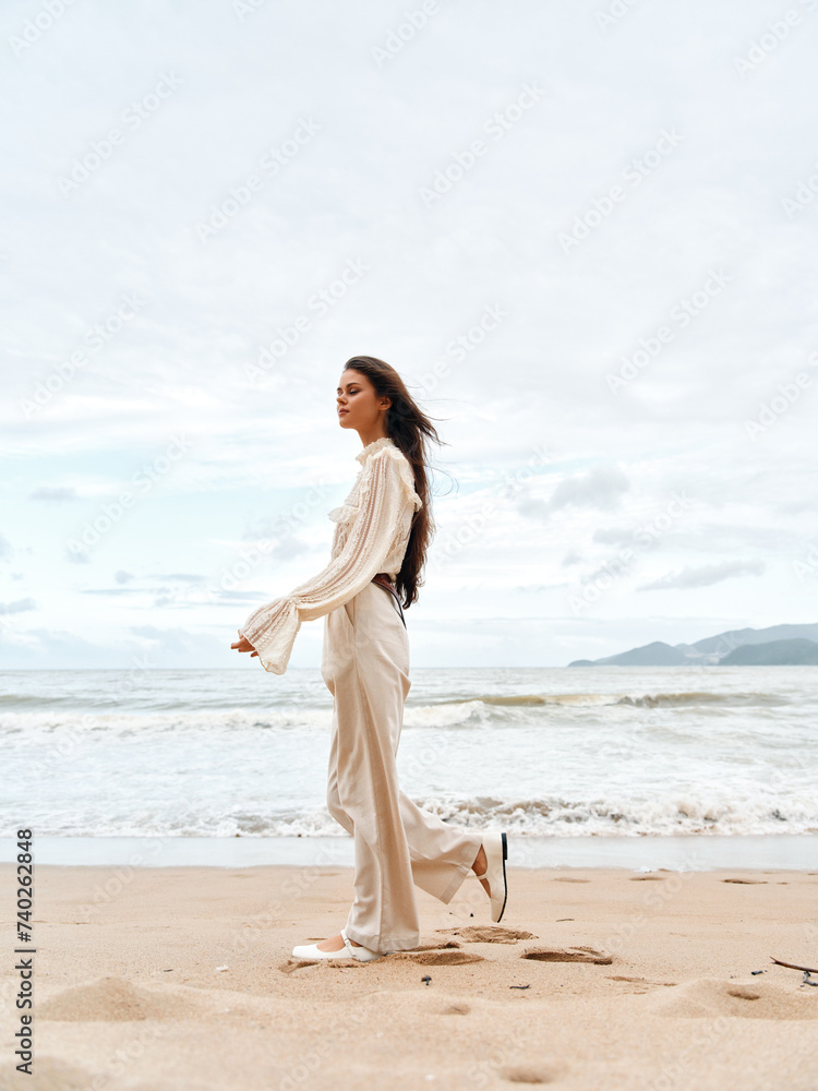 Solitary Summer Beauty: A Serene Asian Lady Enjoying a Relaxing Beach Vacation by the Ocean at Sunset Solitary Summer Beauty: A Serene Asian Lady Enjoying a Relaxing Beach Vacation by the Ocean at Sunset