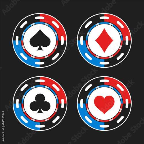 Four vibrant poker chips adorned with the suits of playing cards spades, diamonds, clubs, and hearts isolated on dark background. Chips feature classic design, play in games like poker and blackjack