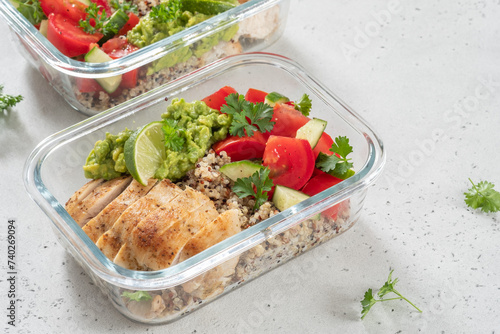 Chicken breast, quinoa and vegetables in lunch box photo