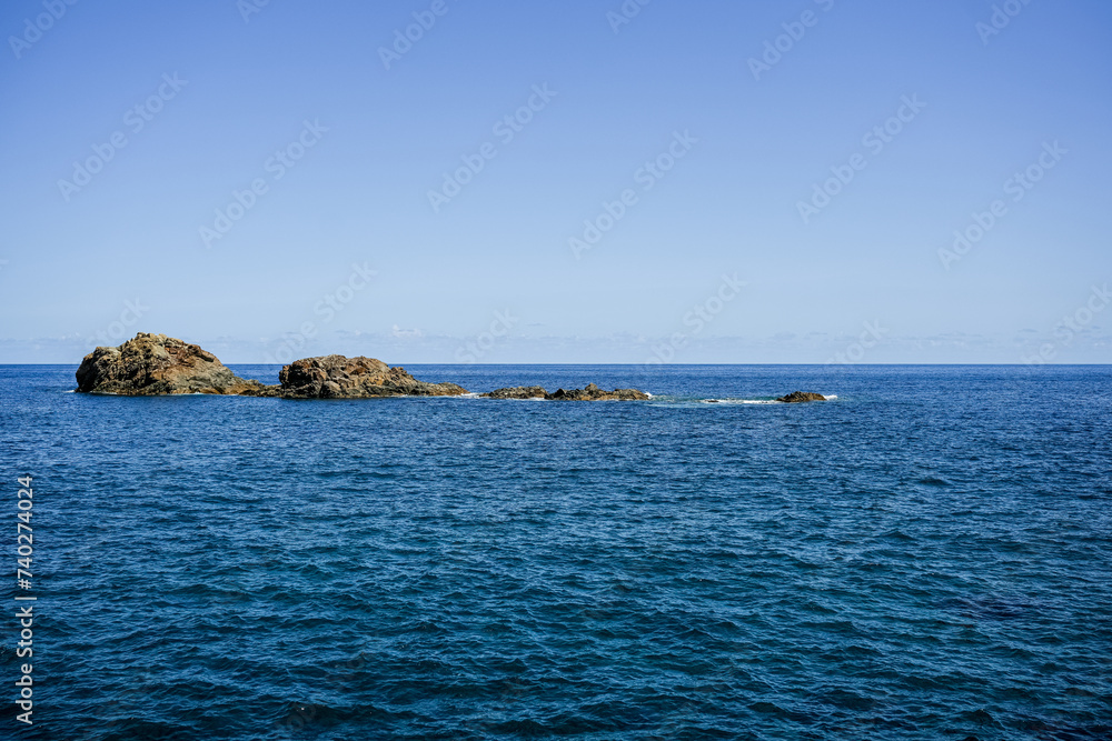Beautiful rocks and turquoise sea on the coast of the Canary Islands, Tenerife Spain	