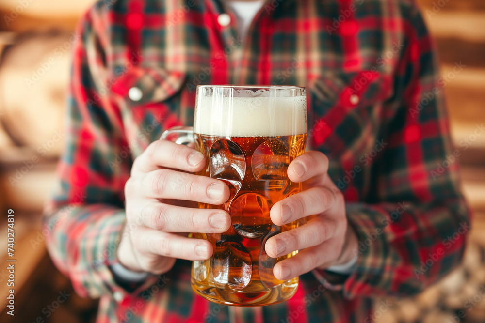 Person Holding a Glass of Beer