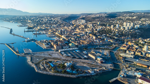 Breathtaking aerial view of Rijeka, Croatia, as a ship is being unloaded in the bustling port  photo