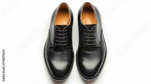 Black leather men's shoes, classic in style, isolated on a white background, viewed from the top