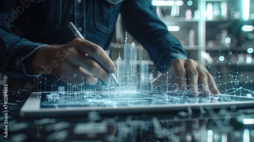 An architect draws on an interactive display to design a futuristic cityscape, illustrating high-tech urban planning.