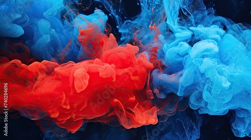 Vivid Acrylic Blue and Red Ink Blots Creating a Dynamic Abstract Smoke Effect