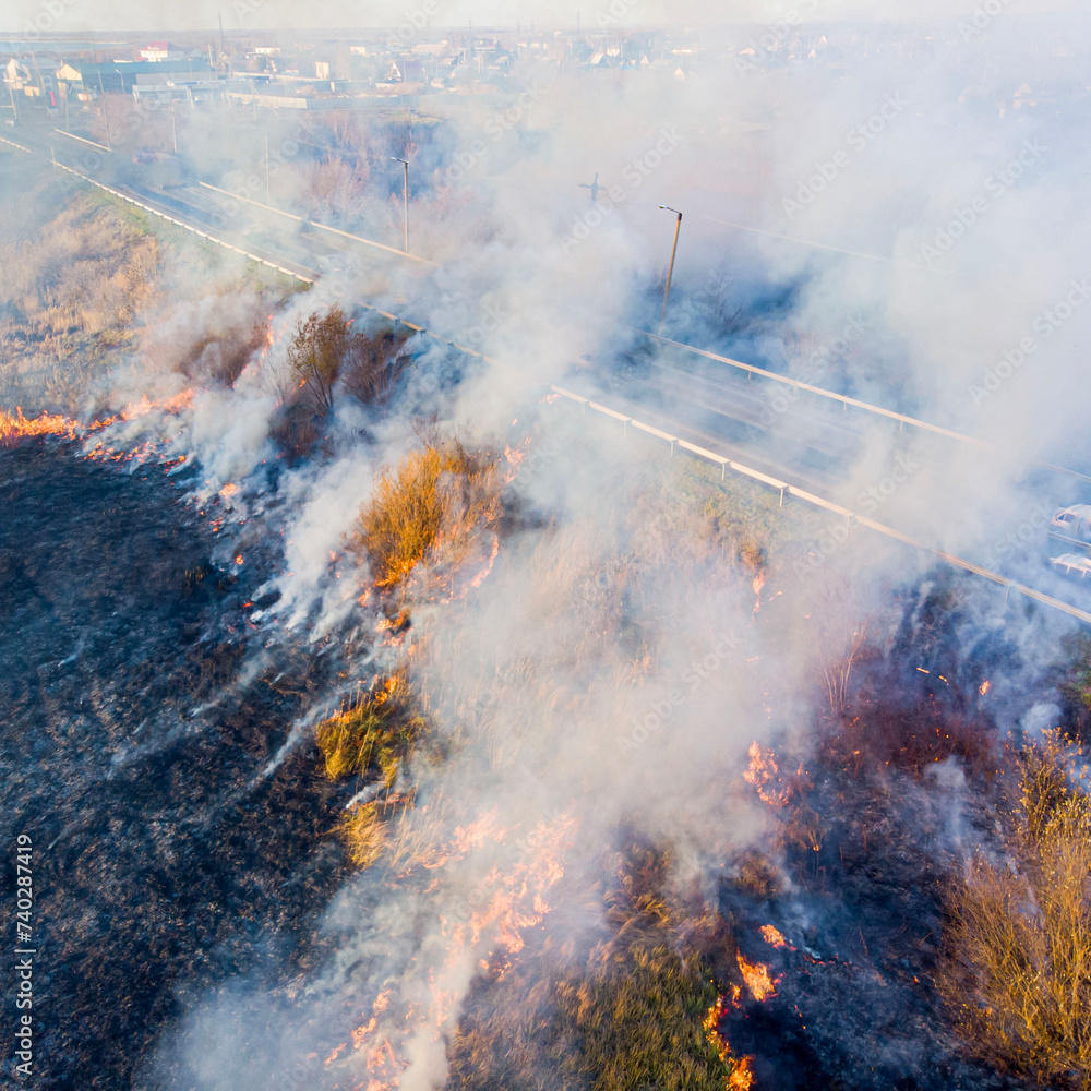 dead wood fire filmed from a quadcopter in the spring at sunset dead wood fire filmed from a quadcopter in the spring at sunset