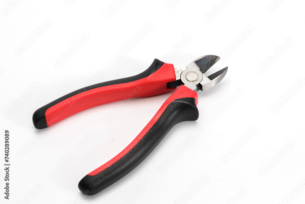 Metal cutting pliers with sharp tip on white background. Metal cutting pliers with sharp tip on white background.