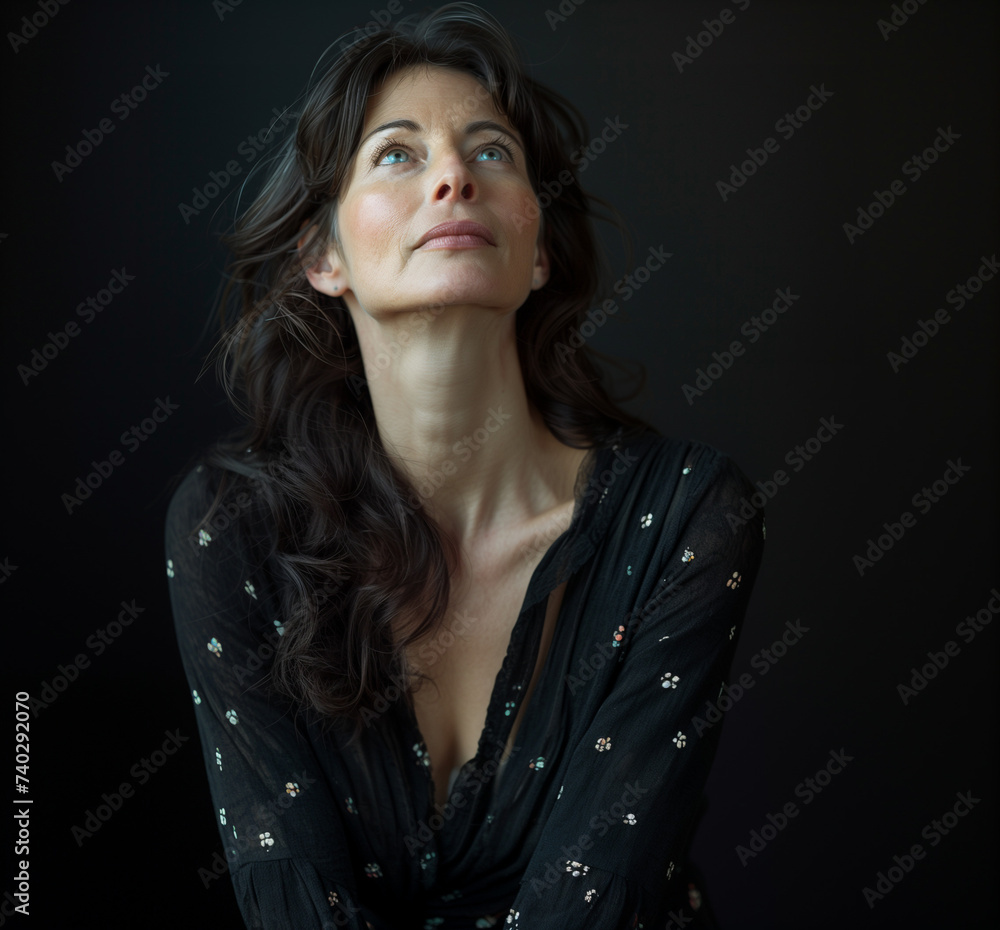 portrait of a mature woman looking up