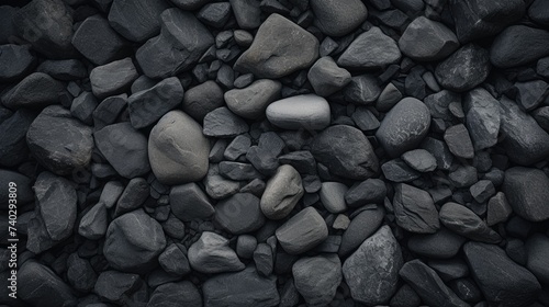 A Rugged Heap of Stones Offering a Textured and Earthy Background Element in Dark Gray