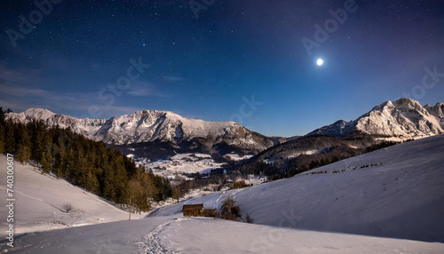 Night winter landscape, snow covered mountains under moon light. 