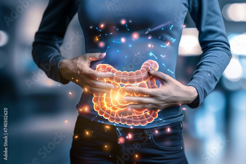 a person witch a stomach ace holding their hands over their stomach with an illustration of intestines super imposed over top