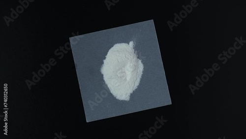 Sample of Sodium Carboxymethyl Cellulose Powder, NaCMC. Food additive E466. Binding agent, Thickener. Increases moisture retention and Extends shelf life products. Texture improver. photo