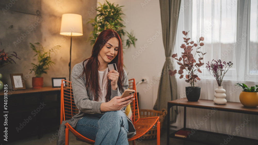 young woman caucasian female hold credit card online shopping at home young woman caucasian female hold credit card online shopping at home