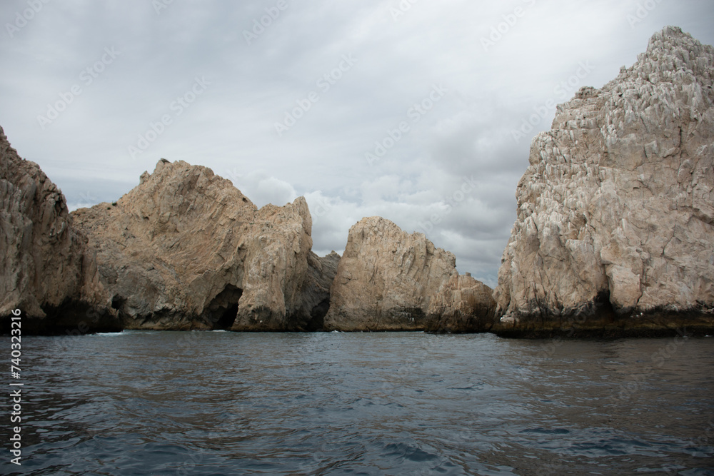 View of the Arch in Los Cabos, Baja California, Mexico. The Cabo Arch on a cloudy winter day.