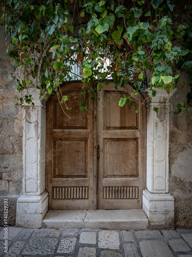 The old door in city Porec, Croatia