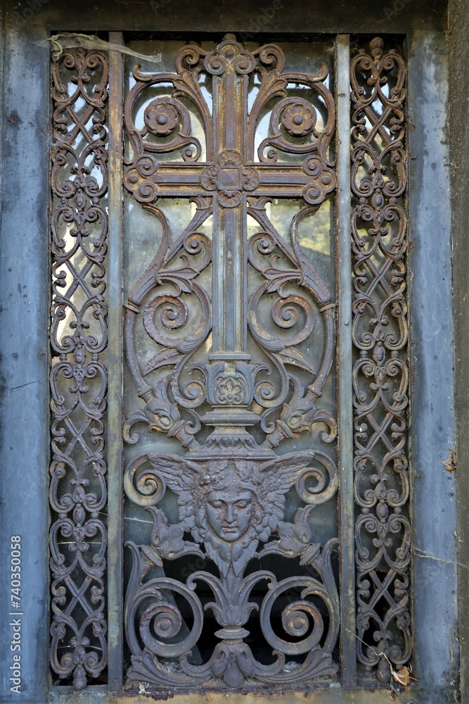 close up ancient weathered wrought metal ornaments close up ancient weathered wrought metal ornaments